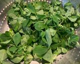 A picture of step 1 of Vendhaya keerai (methi leaves)puli Kuzhambu.
