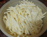 Foto del paso 8 de la receta: Jamoncitos de pollo adobados y asados en freidora de aire con salsa de Cola-Cola y papas fritas