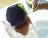 A picture of step 6 of How to Neatly Peel an Avocado.