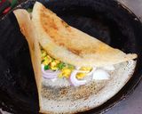 A picture of step 16 of Paneer Masala Dosa.