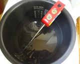 A picture of step 4 of Chicken Confit Using a Rice Cooker.