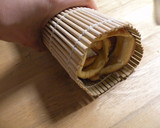 A picture of step 16 of Italian Roll Cake.