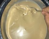 A picture of step 8 of Appam with coconut milk.