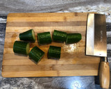 A picture of step 4 of Let's bond over cucumber salad and egg congee.