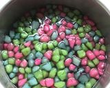 A picture of step 1 of Coconut Jelly with Ruby Water Chestnuts (Woon Kati Tub Tim Grob).