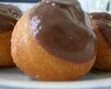 A picture of step 7 of Plain or Chocolate Pon-De-Ring Style Donuts.
