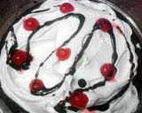 A picture of step 14 of Fudgy Chocolate Chip Cherry Pie.