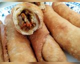 A picture of step 16 of Fried fish roll.