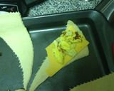 A picture of step 11 of Sausage Egg And Cheddar Cheese Roll Up's.