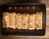 A picture of step 4 of Enchiladas with black bean mole.