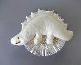 A picture of step 7 of Dinosaur Bread Stegosaurus.