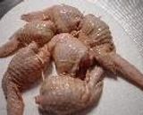 A picture of step 7 of Chicken Wing Gyoza (with chicken de-boning instructions).