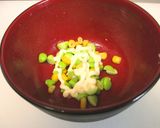 A picture of step 2 of Two Kinds of Onigiri Rice Balls with Corn and Edamame Beans.