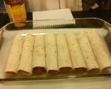 A picture of step 7 of Hot Dog Enchiladas.
