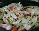 A picture of step 6 of Crockpot Italian sausage and cabbage.
