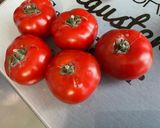 Une image de l'étape 7 de Poulet aux cacahuètes, carottes, tomates et épices.