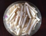 A picture of step 2 of California Farm Pickled Turnip Sticks.