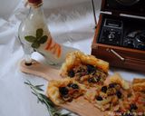 A picture of step 13 of Puff pastry pizza with Raisins & bell pepper.