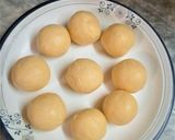 A picture of step 8 of Gullab gamoon.