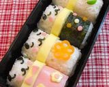 A picture of step 7 of Santa Barrel Cats Character Bento.