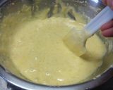 A picture of step 10 of Fluffy Madeleines with Orange Peels.