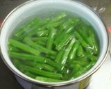 A picture of step 2 of Chikuwa Wraps with Green Beans.