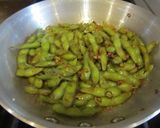 A picture of step 7 of Garlic Edamame - Great When Drinking.