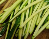 A picture of step 1 of Pickled baby marrow.