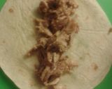 A picture of step 9 of Pork Roast Enchiladas.