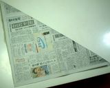 A picture of step 3 of Castella Cake in a Newspaper Mold.