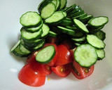 A picture of step 1 of Easy Tomato and Cucumber Salad with Sesame Ponzu Dressing.