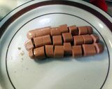 A picture of step 5 of cheesy corn dog bites.