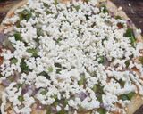 A picture of step 9 of Veg Cheese Paneer Pan Pizza.