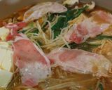 A picture of step 7 of Kimchi Hotpot with Kimchi Stock.
