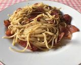 A picture of step 9 of Fettucine aglio olio e peperoncino with sweet pork sausage.