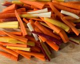 A picture of step 2 of Roasted Carrots with Thyme, Oregano, and Parsley.