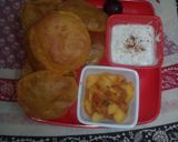 A picture of step 16 of Gujrati masala puri with aloo sabji.