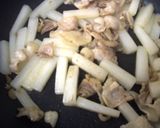 A picture of step 3 of Stir-fried and Simmered Daikon Radish, Pork, and Atsuage.