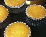 A picture of step 11 of Fluffy Madeleines with Orange Peels.