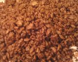 A picture of step 3 of sunshine's earth worm cocoa krispies squares.