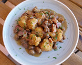 Foto del paso 14 de la receta: Coliflor rebozada en salsa con champiñones y panceta a la pimienta