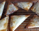 A picture of step 10 of Spicy beef triangles.