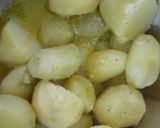 A picture of step 6 of My New Potatoes in Garlic Parsley Butter with Pea Pods 😙.