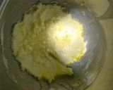 A picture of step 3 of Professional cinnamon rolls topped with cream cheese icing.