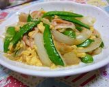 A picture of step 6 of Sweet Onion and Snow Peas with Fluffy Scrambled Eggs.