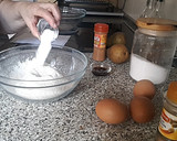 Foto del paso 3 de la receta: Cupcakes de pera relleno de bombón