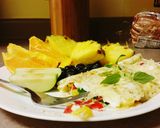 A picture of step 7 of Garden veggie and herb omelet.
