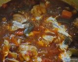 A picture of step 10 of Chicken Cacciatora.