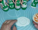 A picture of step 3 of Ready-made cupcakes with Fondant topper independence day theme.