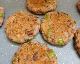 A picture of step 3 of Galouti kebab on crispy naan.